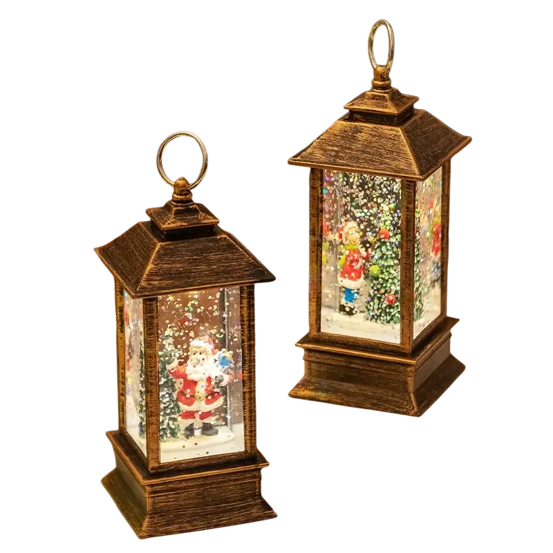 Lighted bronze christmas snow globe lanterns featuring bronze finish and illuminated santa claus festive scenes