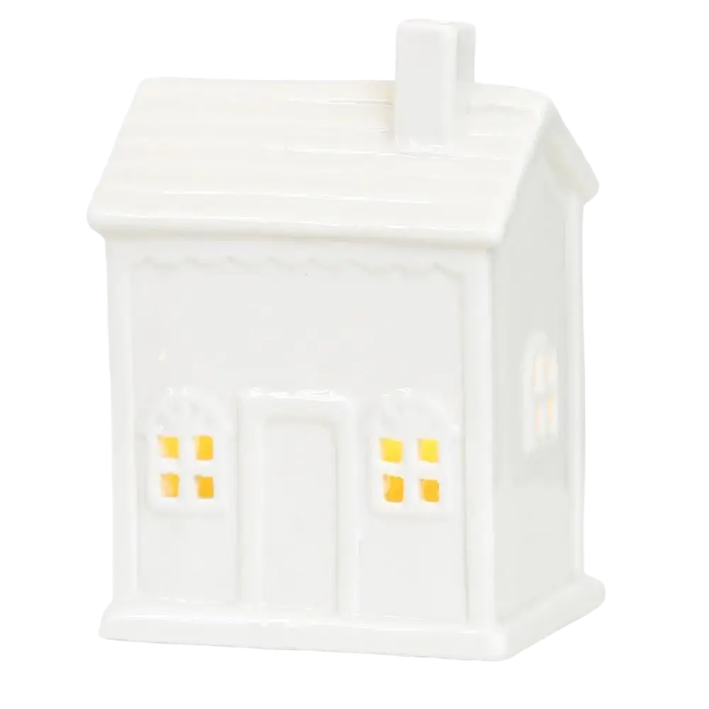 White ceramic christmas village house lantern with glowing yellow led light for enchanting winter wonderland decor
