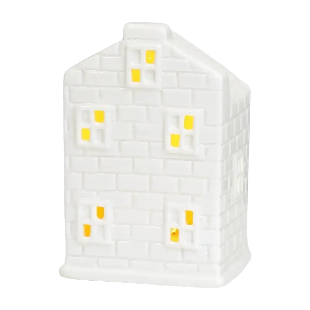 White ceramic house-shaped lantern with yellow led windows for christmas village houses and enchanting winter wonderland decor