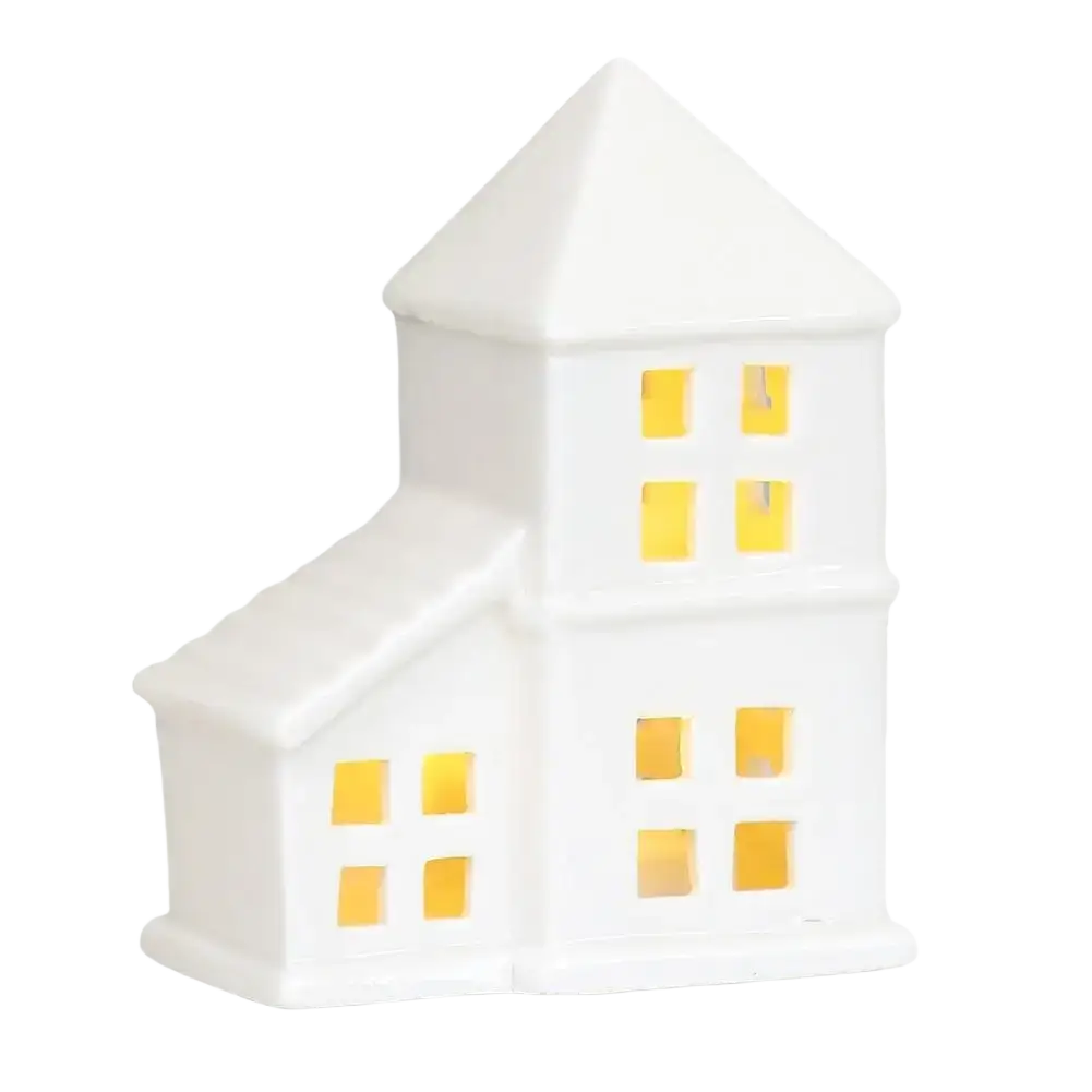 White ceramic christmas village house lantern with glowing yellow led light for enchanting winter wonderland decor