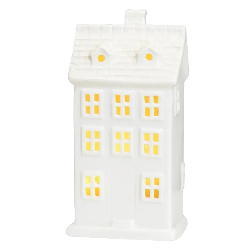 White ceramic house lantern with glowing yellow lights for enchanting winter wonderland christmas village houses décor