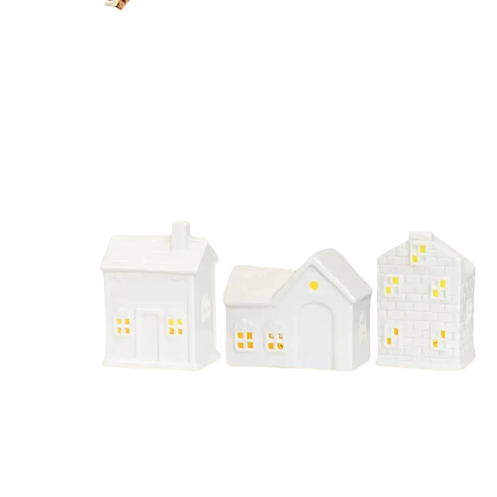 Three white ceramic christmas village houses with led lights create an enchanting winter wonderland decor