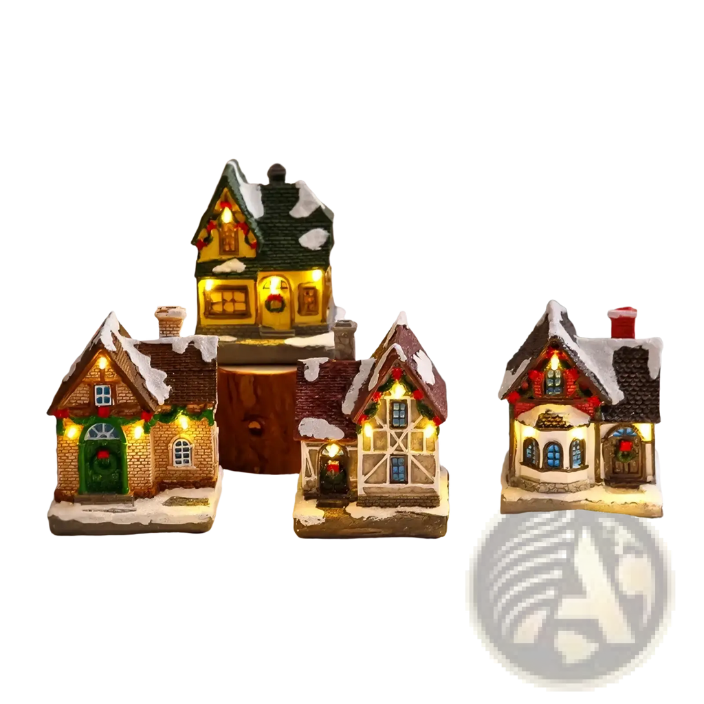 Lighted christmas village house ornament featuring miniature illuminated houses with snow-dusted roofs and festive garlands