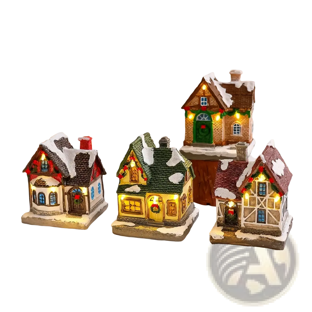 Lighted christmas village house ornament featuring three miniature houses with snow-dusted roofs and glowing windows