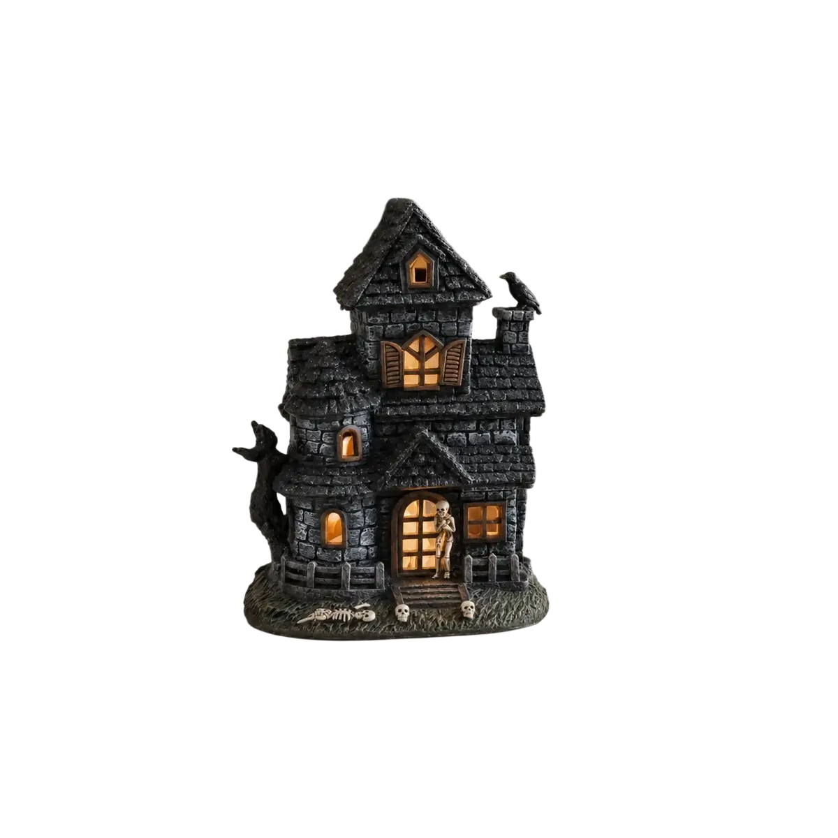 Dark gray lighted haunted house resin figurine with glowing orange windows, skeleton at door, skulls, and crow decoration