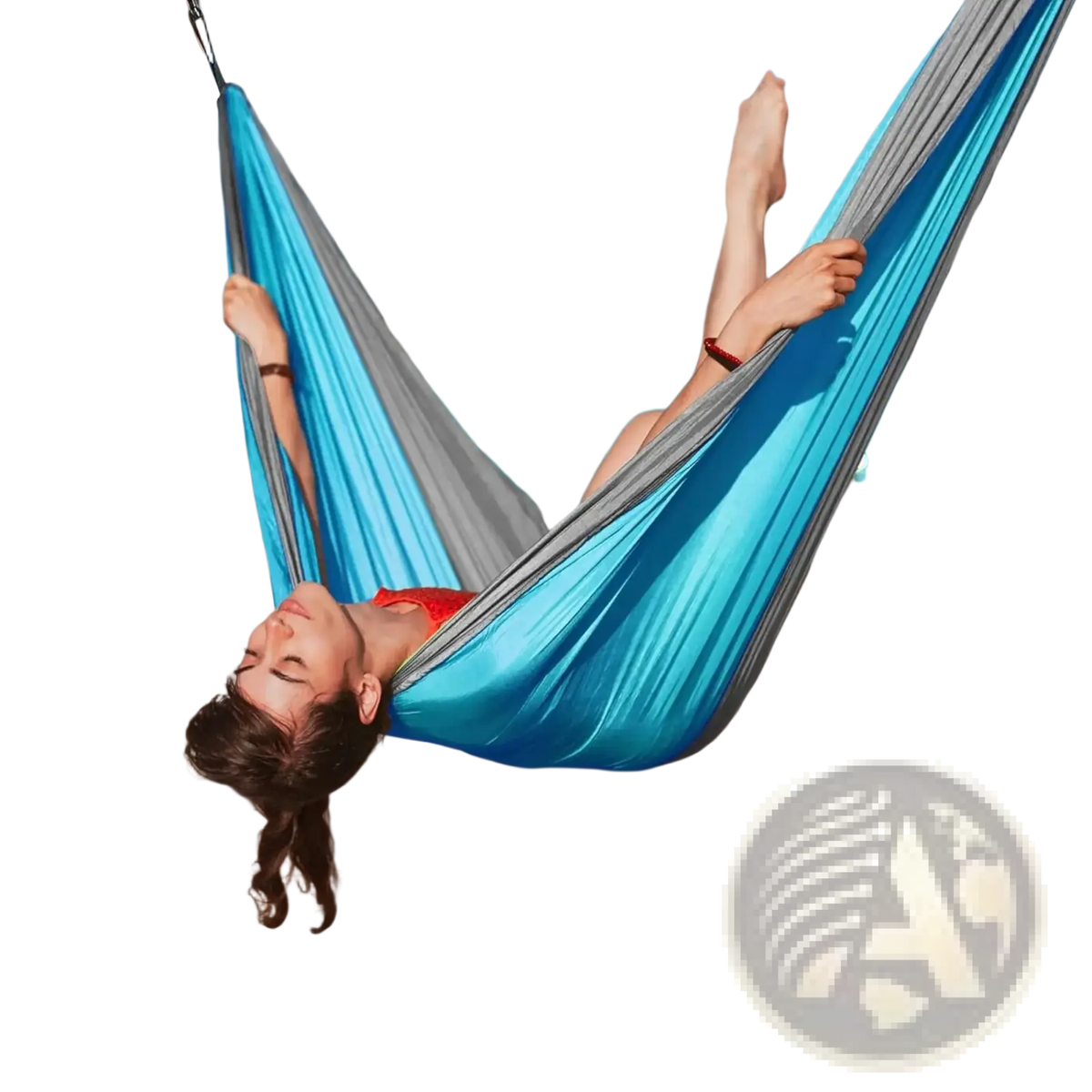 A vibrant blue and gray striped lightweight nylon camping hammock with tree straps made of soft silk-like material