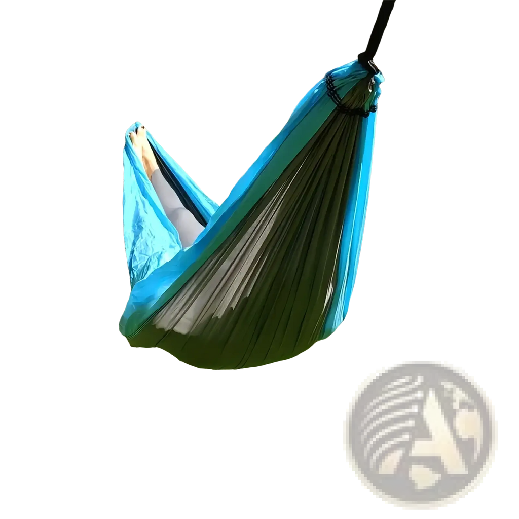 A vibrant blue and green lightweight nylon camping hammock with sleek fabric design and included tree straps