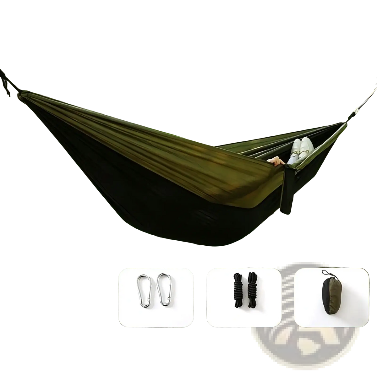 Lightweight camping hammock in camouflage black and olive green fabric suspended between trees in outdoor setting