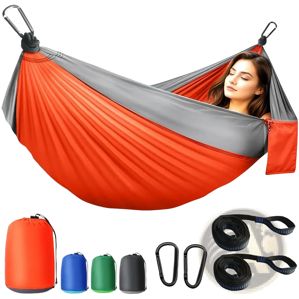 Lightweight orange and gray two-tone nylon camping hammock with carabiner attachments for easy setup