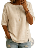 A soft off-white linen asymmetrical button casual top with relaxed fit and three-quarter sleeves