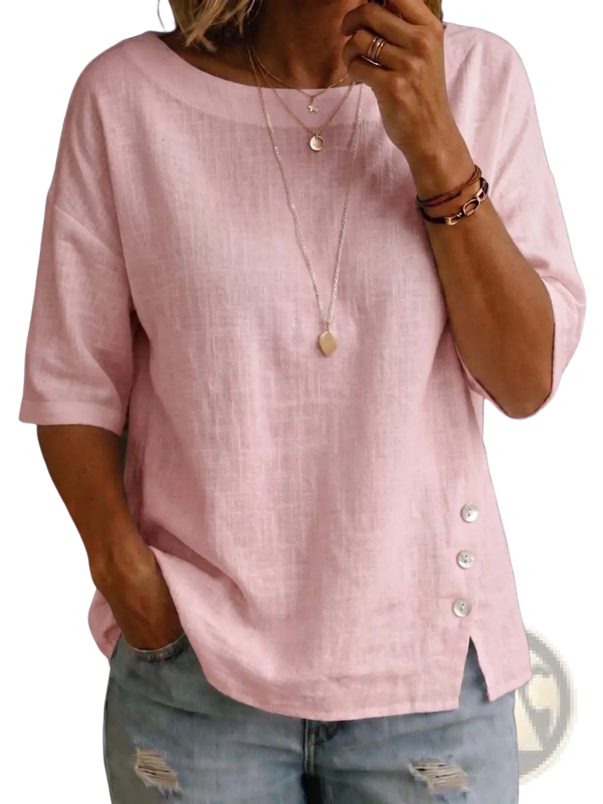 A soft pink linen asymmetrical button casual top with three quarter sleeves and silver side buttons