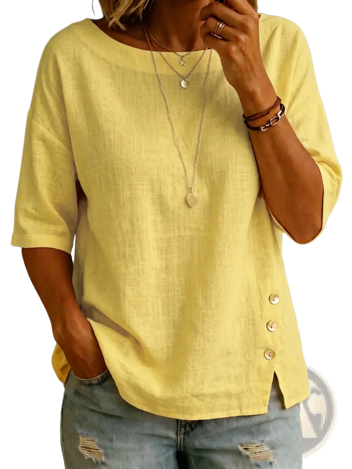 A soft yellow linen asymmetrical button casual top with three-quarter sleeves and side button detail