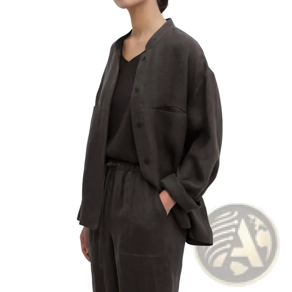 A loose-fitting dark olive linen blouse button up oversized shirt for women with a relaxed fit and button closure