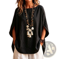 Black linen cape top with relaxed fit batwing sleeves made of loose cotton fabric for comfortable wear