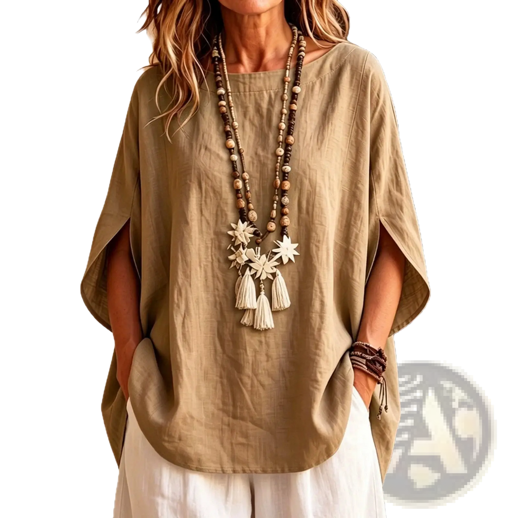 Beige linen cape top with relaxed fit and wide batwing sleeves in a lightweight breathable fabric