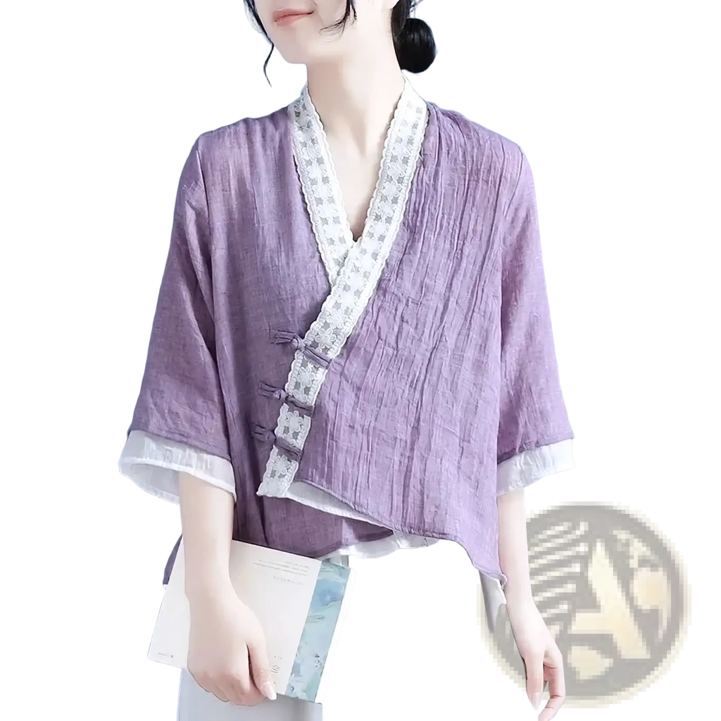 A lavender linen lace vneck blouse for women featuring textured fabric and white lace trim on collar and cuffs