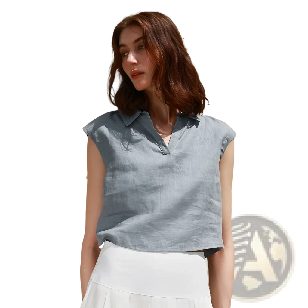 A light blue sleeveless linen blouse with a collar and buttoned placket featured as a linen lapel sleeveless vest