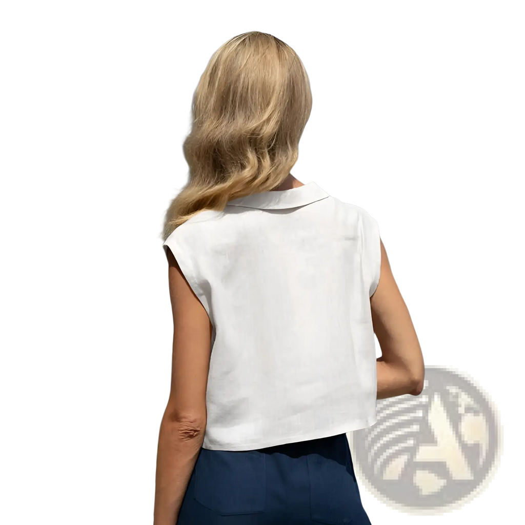 White sleeveless linen vest with a lapel collar made from breathable linen fabric for stylish summer wear