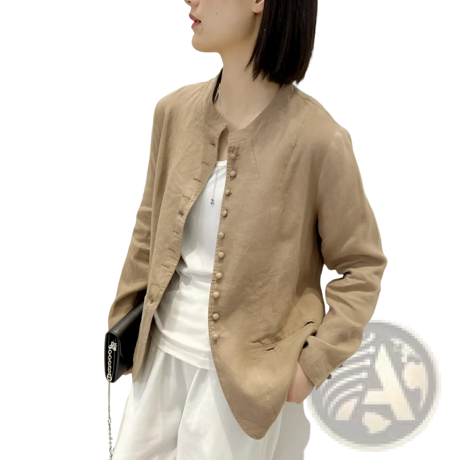 Beige linen patchwork jacket with button closure and subtle texture in a relaxed fit style