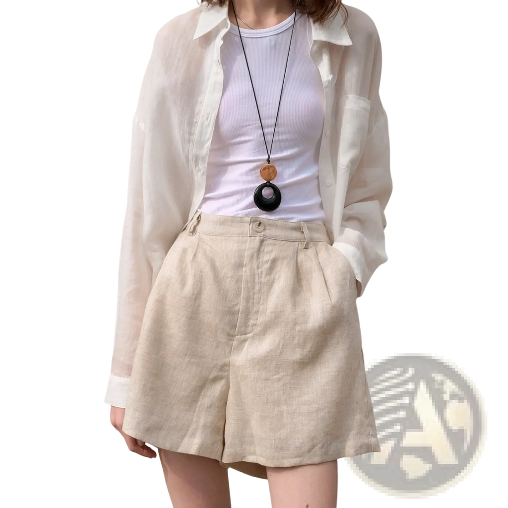 Beige linen trousers with loose fit and pleated front pockets designed as casual pants