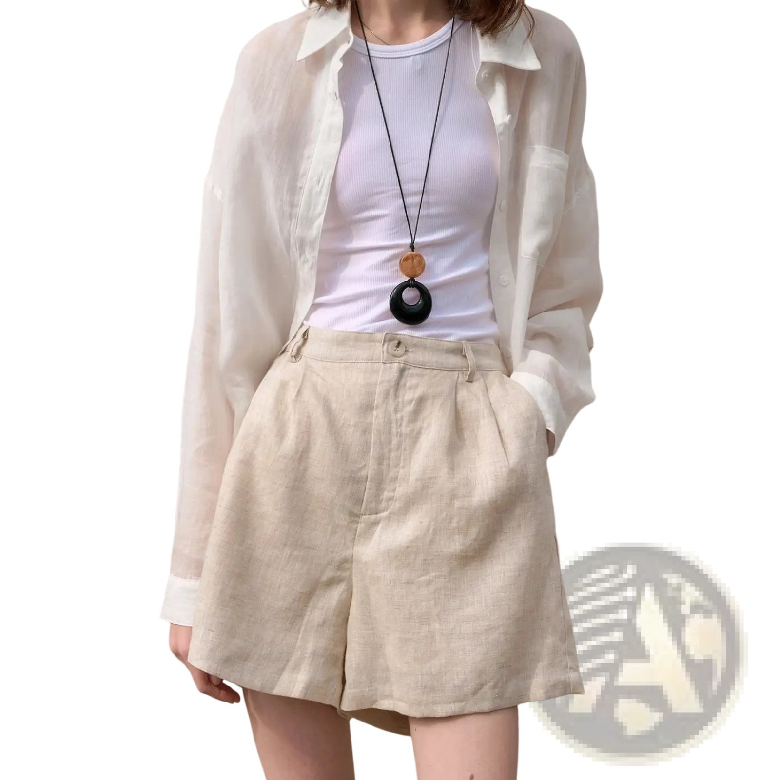 Beige linen trousers with loose fit and pleated front pockets designed as casual pants