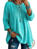 Turquoise linen tunic loose casual long sleeve top with rolled-up sleeves and slightly asymmetrical hemline