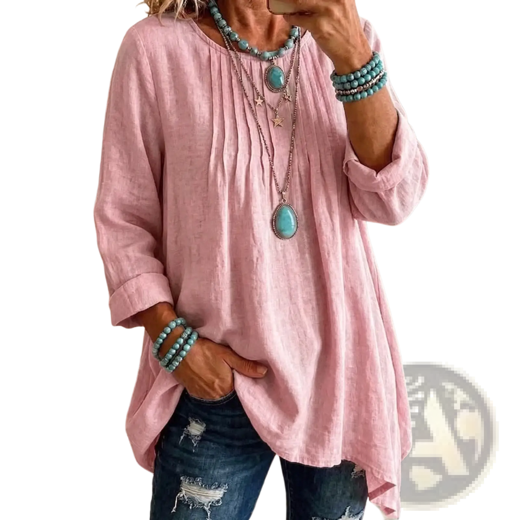 A soft pink linen tunic loose casual long sleeve top with rolled-up sleeves and a relaxed fit