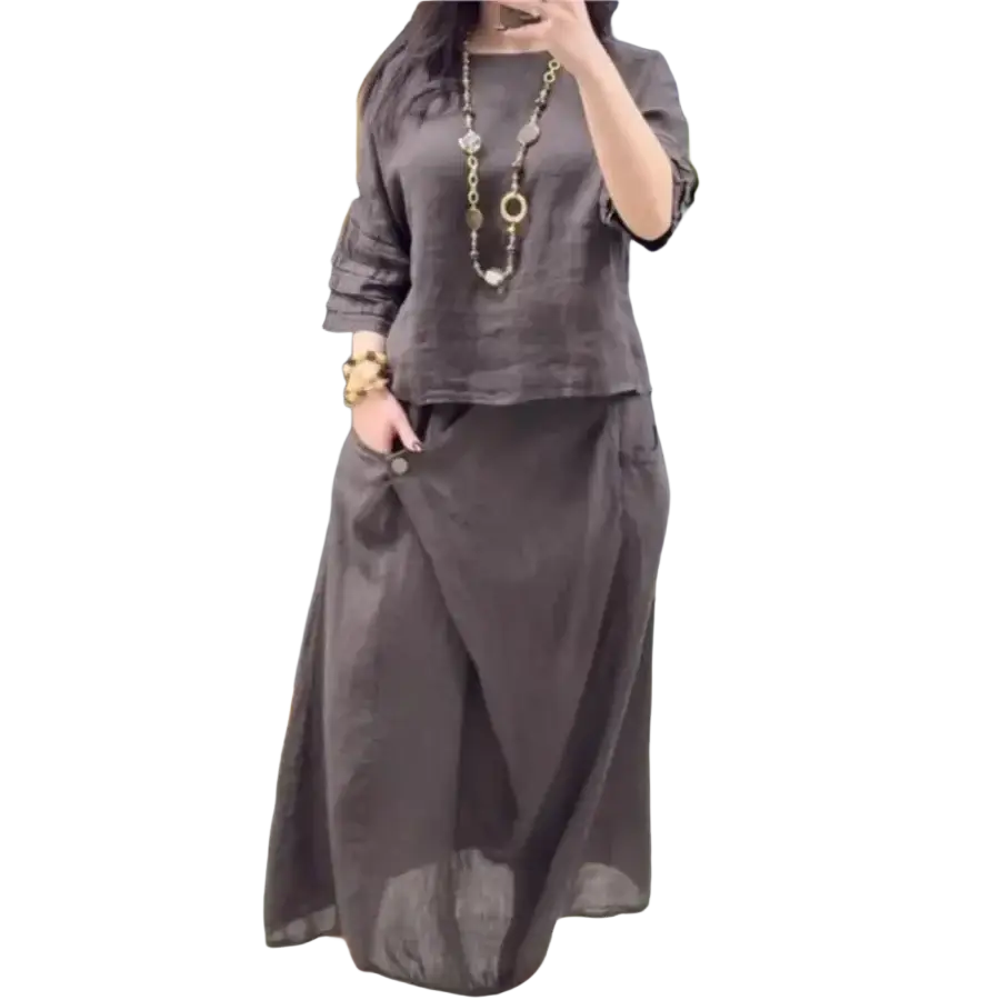 Dark gray linen two piece set with loose fitting blouse and flowing midi skirt for casual wear and delivery protection time