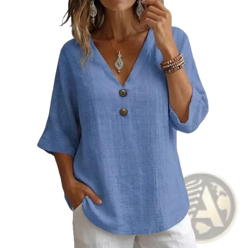Light blue loose-fitting linen v-neck button top with three-quarter sleeves for casual wear
