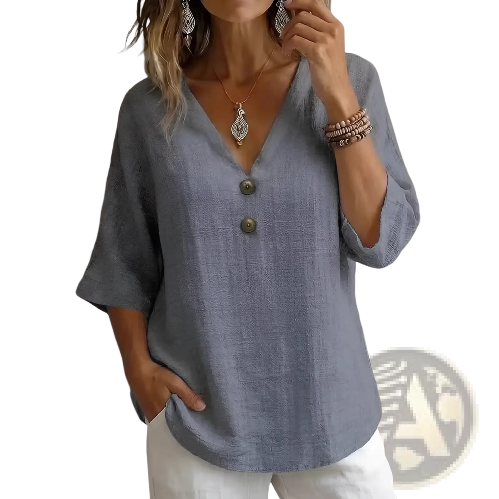 A soft light gray linen v-neck button top with three-quarter sleeves ideal for casual and formal wear