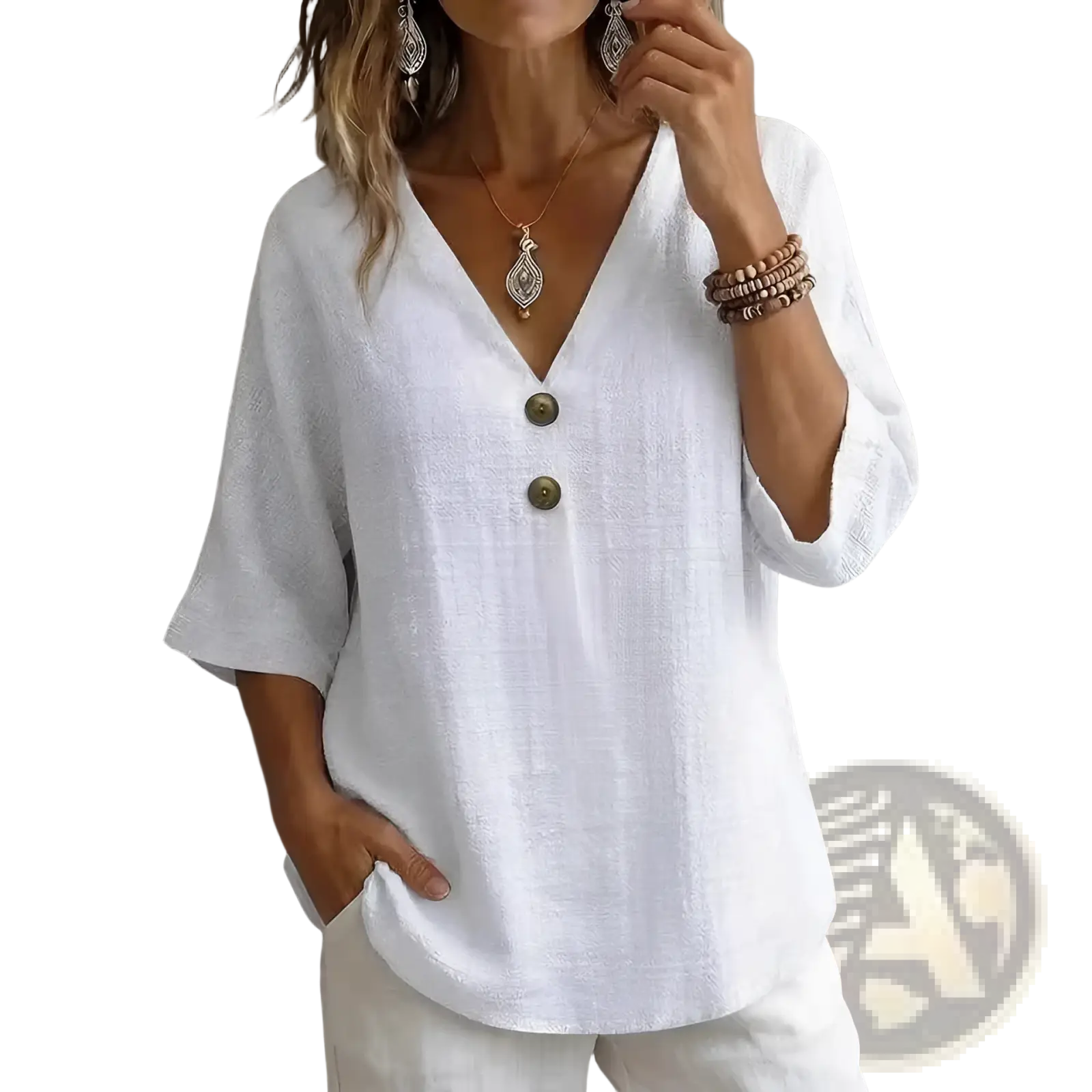 White linen blouse with v-neck and three-quarter sleeves featuring dark green buttons down the front