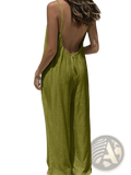 A flowing olive green linen wide leg backless jumpsuit with thin straps shown from the back side