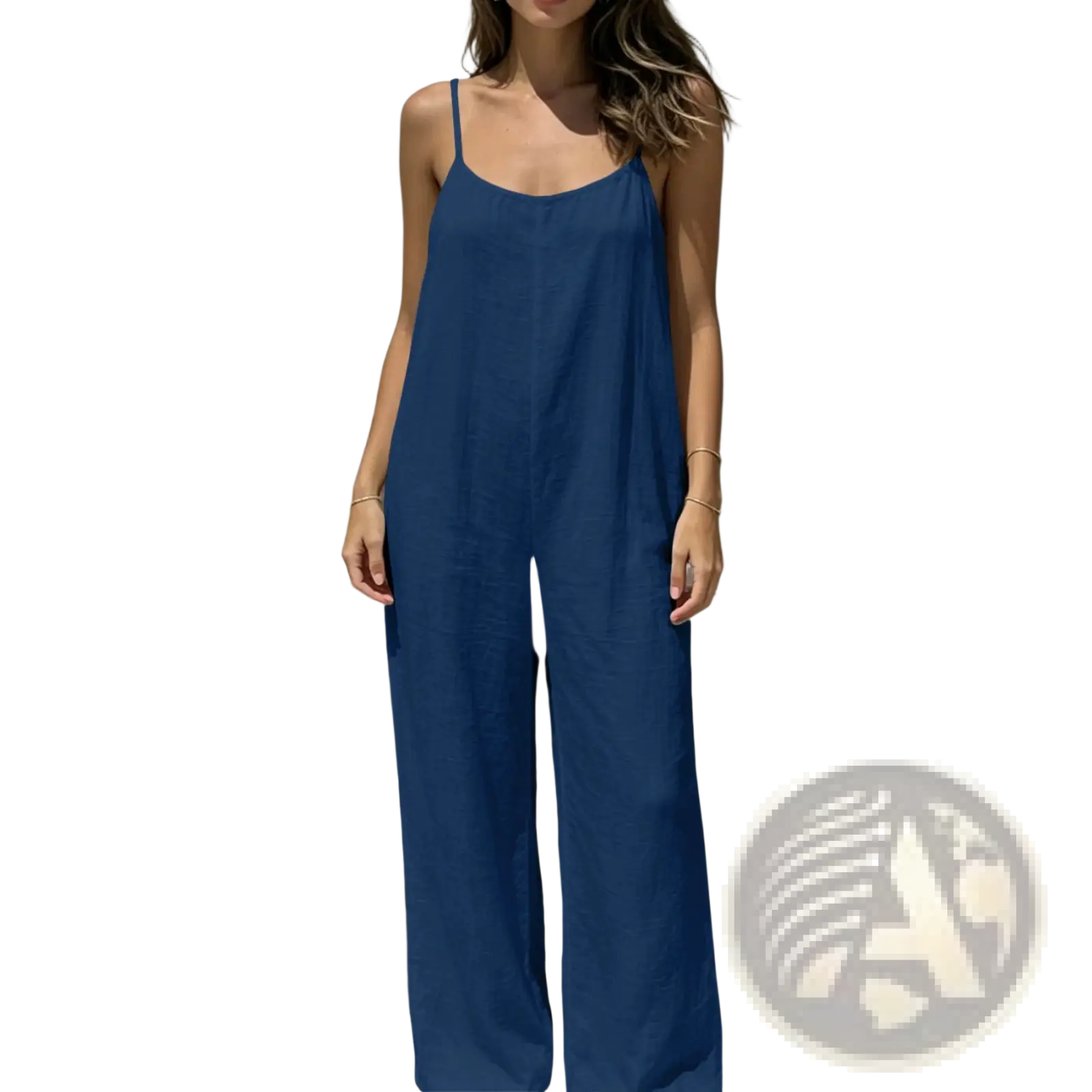 A woman wearing a navy blue linen sleeveless wide-leg backless jumpsuit with thin spaghetti straps