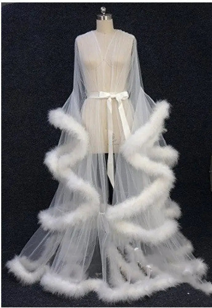 Luxurious tulle and fur trim bridal robe nightgown in white sheer fabric with voluminous feathered trim and satin sash