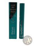 Teal-colored cylindrical tube of thrive causemetics liquid lash extensions waterproof mascara