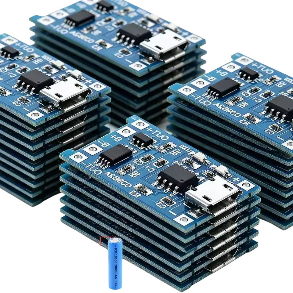 Lithium battery micro usb charging boards with blue circuit boards black integrated circuits and silver usb ports stacked in piles