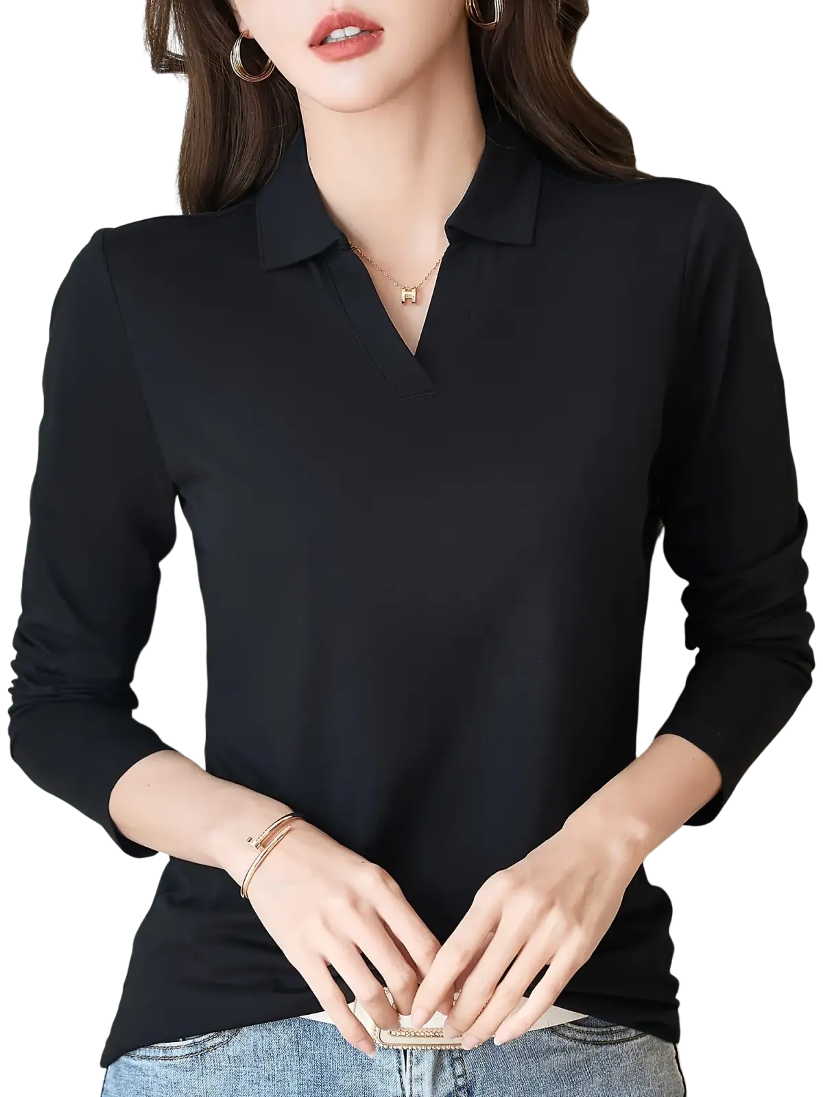 Black long sleeve knit polo shirt for women with a sleek minimalist design and subtle sheen in premium fabric
