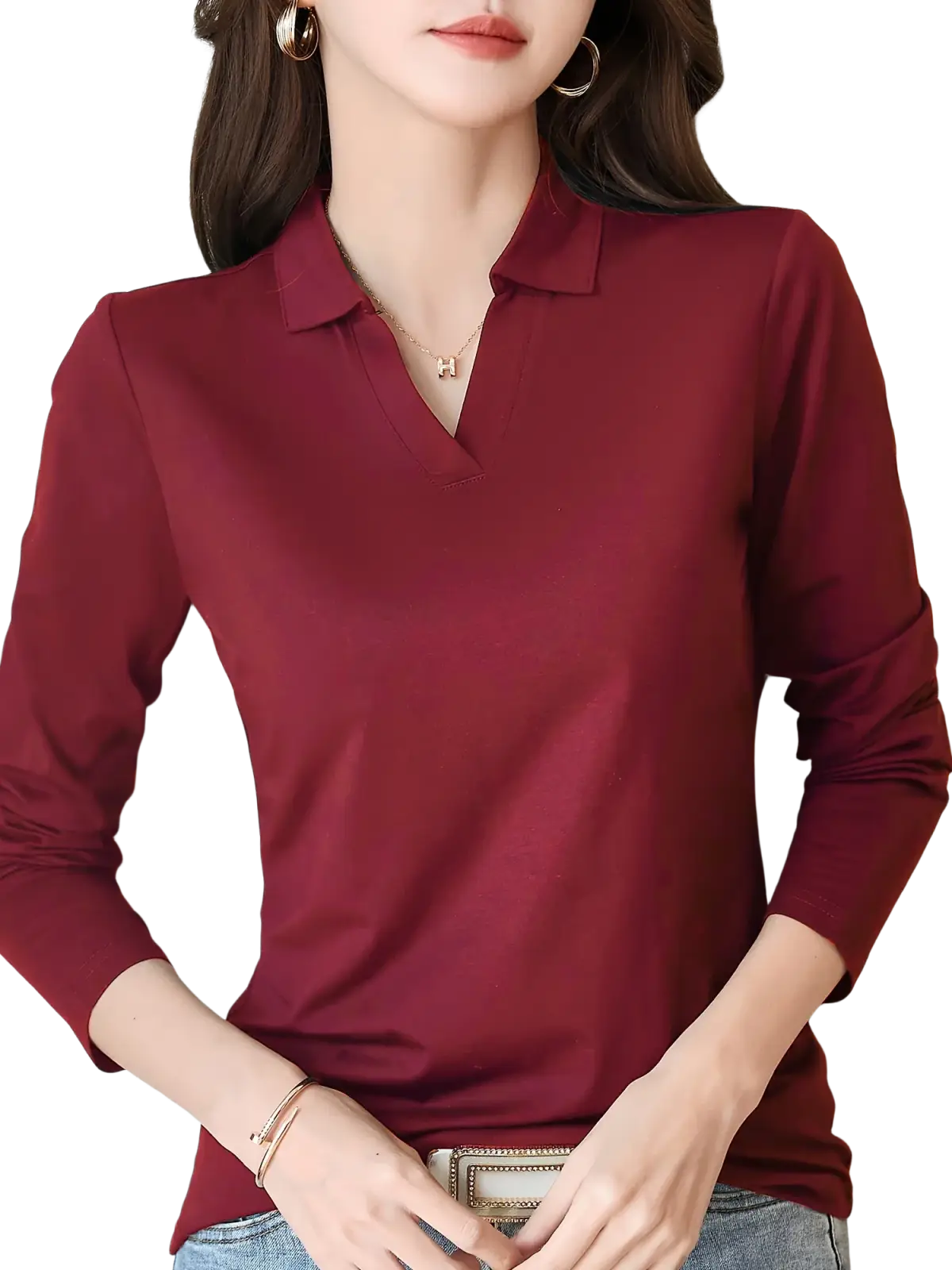 A sleek deep red long sleeve knit polo shirt for women with a classic collar and subtle sheen