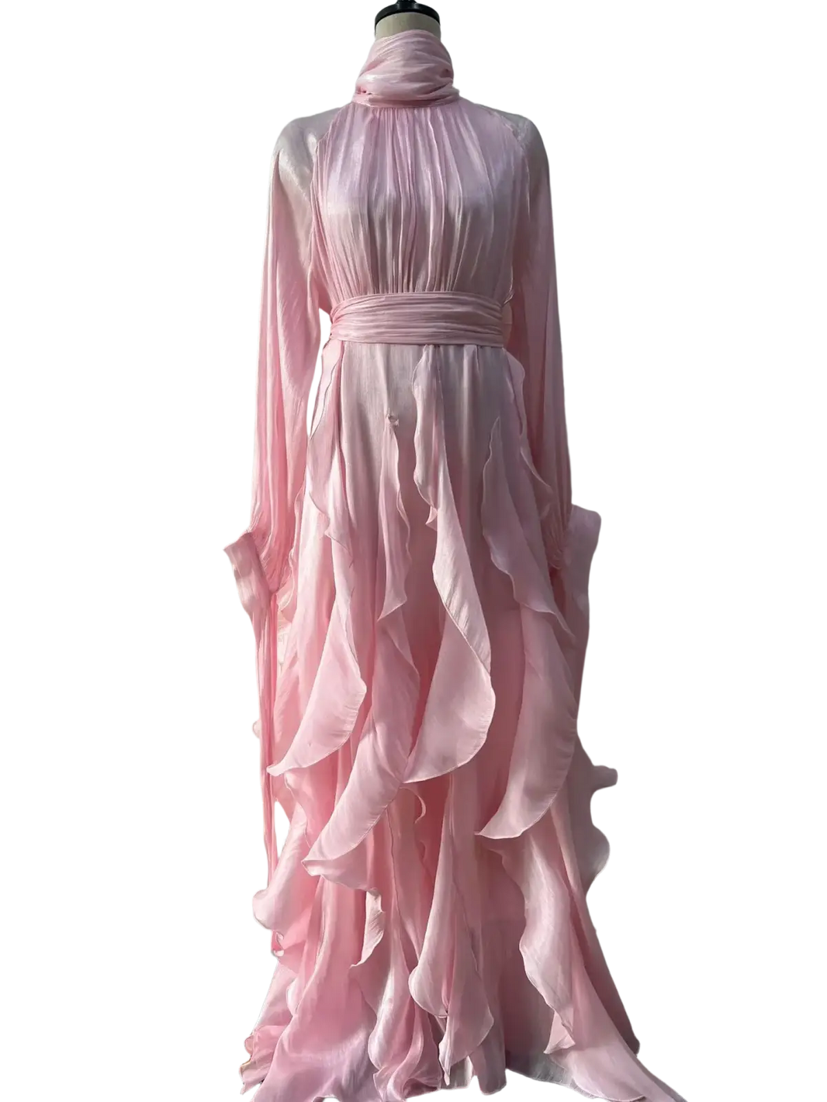 A flowing pale pink satin long sleeve evening dress with high neckline and layered ruffle skirt details