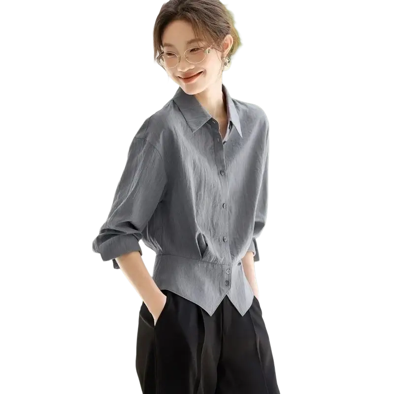 Gray linen long sleeve shirt with relaxed fit and rolled sleeves designed as a slim fit office blouse for women