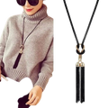 Black tassel long sweater necklace for women with gold alloy knot and metallic accents