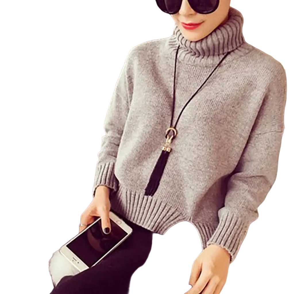 Gray turtleneck sweater with ribbed cuffs and hem paired with a black gold alloy long tassel sweater necklace for women