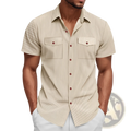 Beige loose corduroy short sleeve workwear shirt with fine vertical stripes and brown buttons front view