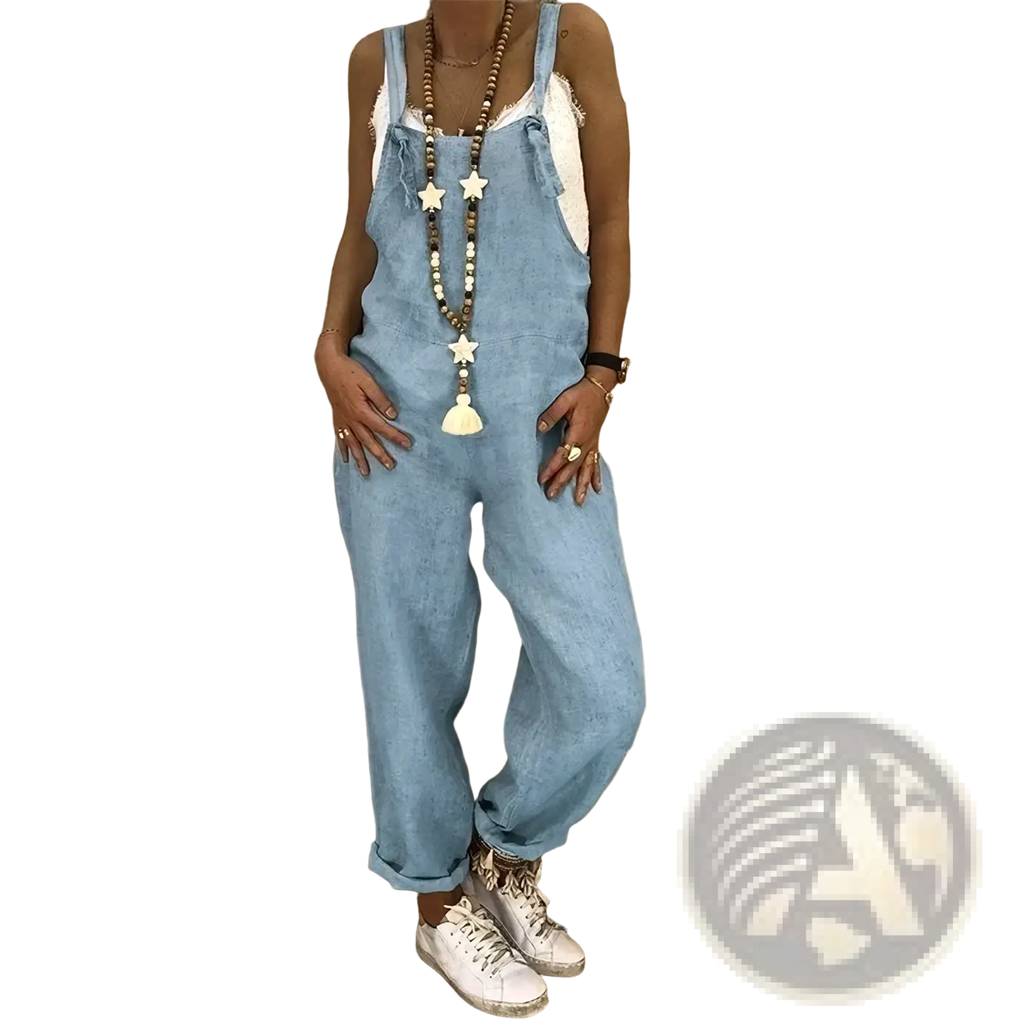 Light blue denim loose summer overalls for women with relaxed fit and rolled cuffs made of breathable denim fabric