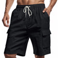 Men’s relaxed black linen cargo shorts with white drawstring waistband and multiple side pockets for casual wear