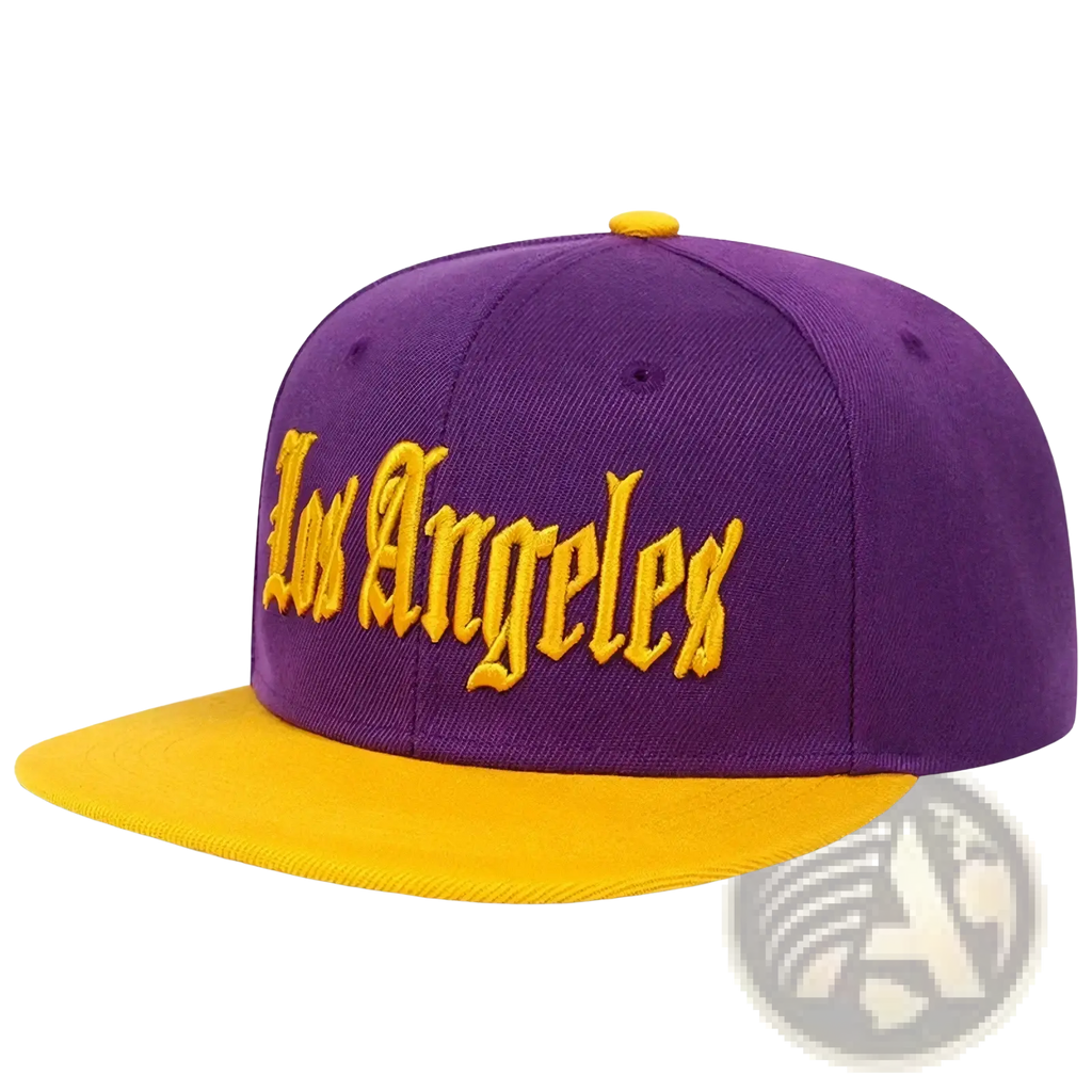 Purple and gold snapback cap with los angeles embroidered in yellow script on the front panel
