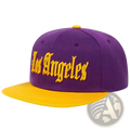 Purple and gold snapback cap with los angeles embroidered in yellow script on the front panel