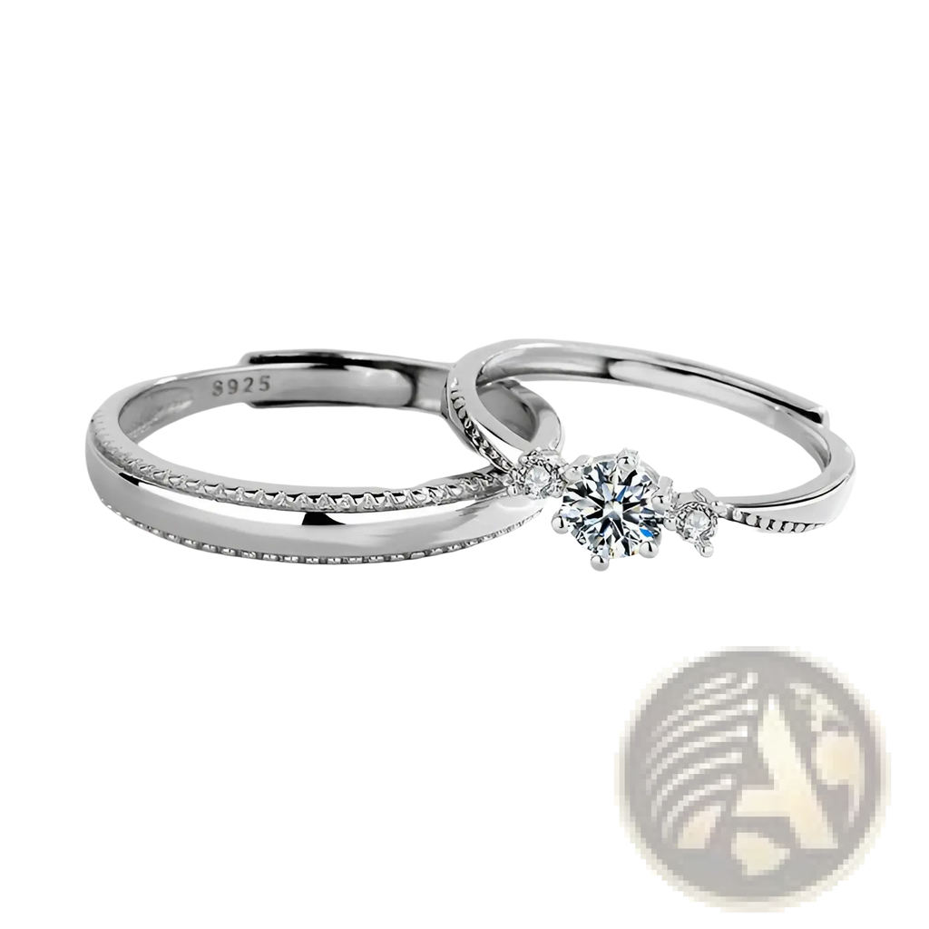 A sleek silver 925 sterling silver couple ring love at first sight with central round diamond and beaded edge design