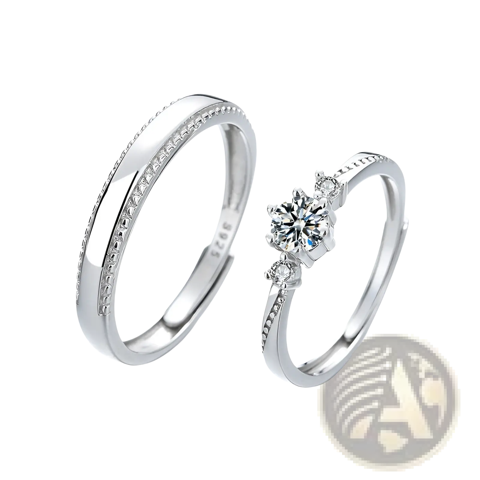 A sleek silver 925 sterling silver couple ring set featuring wide bands with embedded diamonds and three-stone solitaire design