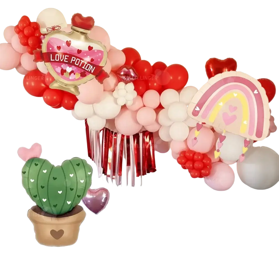 Love Potion and Cactus Valentine balloon kit features a whimsical red pink and white balloon garland with a gold accented love potion bottle balloon